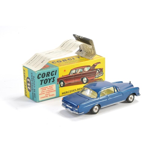 204 - Corgi No. 253 Mercedes Benz 220 SE Coupe. Dark Blue with off-white interior (spare wheel plus brown ... 