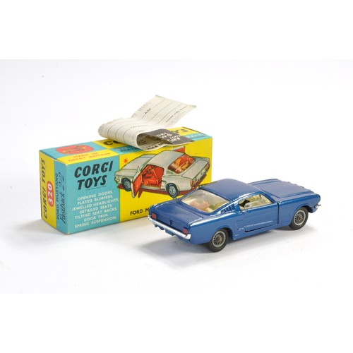 211 - Corgi No. 320 Ford Mustang Fastback 2+2. Dark Blue with white interior. Generally excellent with ver... 