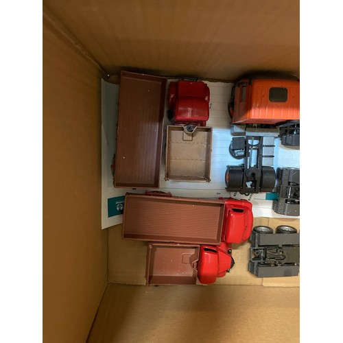 123 - A group of Code 3 1/50 truck issues in orange colour scheme on Tekno / Joal base units as shown. Plu... 