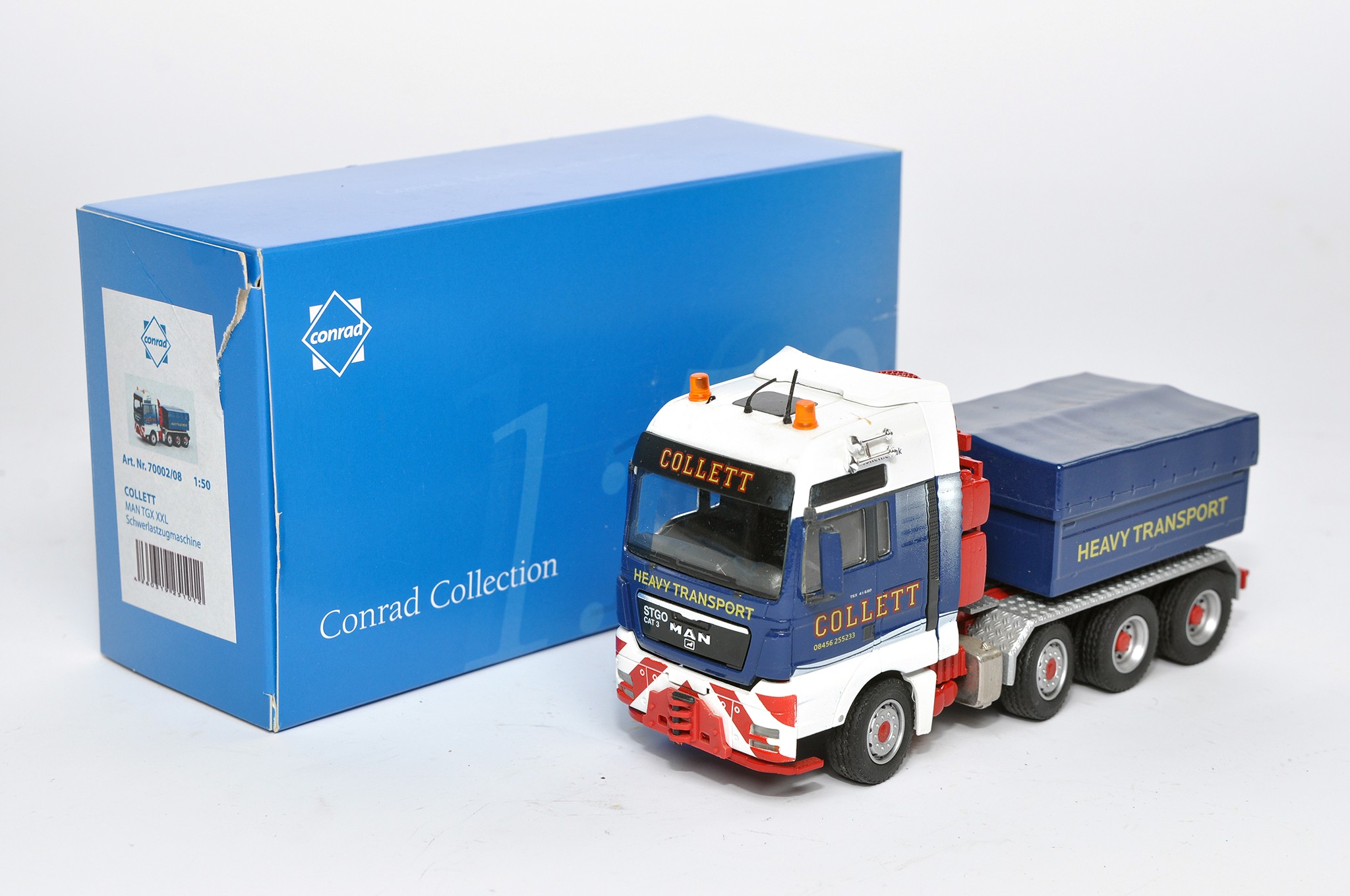 Conrad 1/50 diecast model truck issue comprising no. 70002/08 MAN TGX XXL  in the livery of Collett.