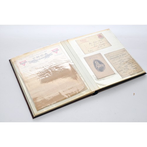 208 - An interesting album of postal history, greeting cards and other interesting items, mostly early 20t... 