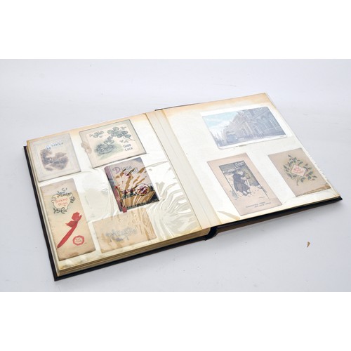 208 - An interesting album of postal history, greeting cards and other interesting items, mostly early 20t... 