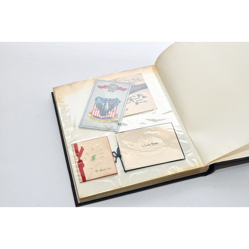 208 - An interesting album of postal history, greeting cards and other interesting items, mostly early 20t... 