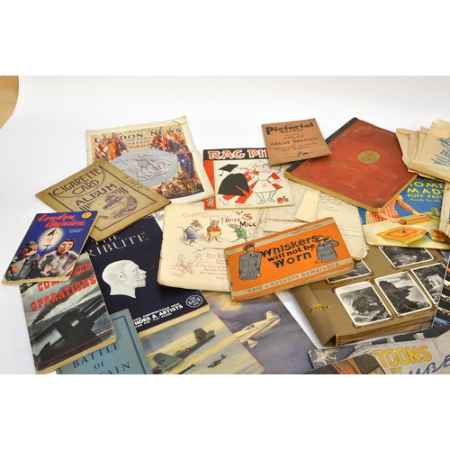 219 - A large collective group of paraphernalia, ephemera and vintage bygones. Including magazines, childr... 