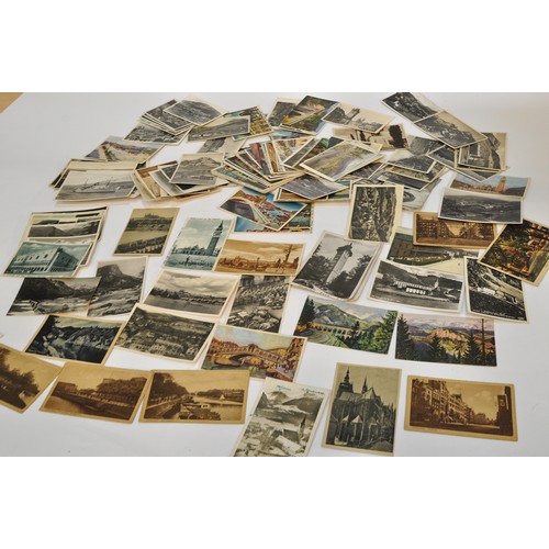 223 - A large collection of vintage postcards, both illustrated and photographs, from mostly European coun... 