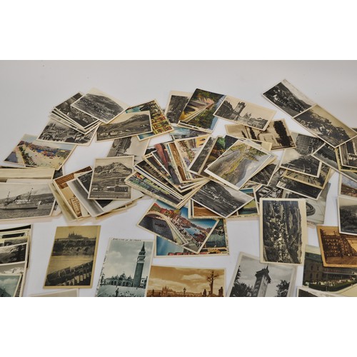 223 - A large collection of vintage postcards, both illustrated and photographs, from mostly European coun... 