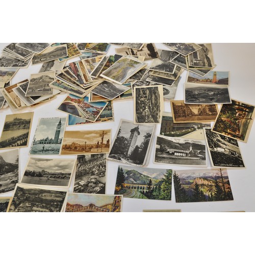 223 - A large collection of vintage postcards, both illustrated and photographs, from mostly European coun... 