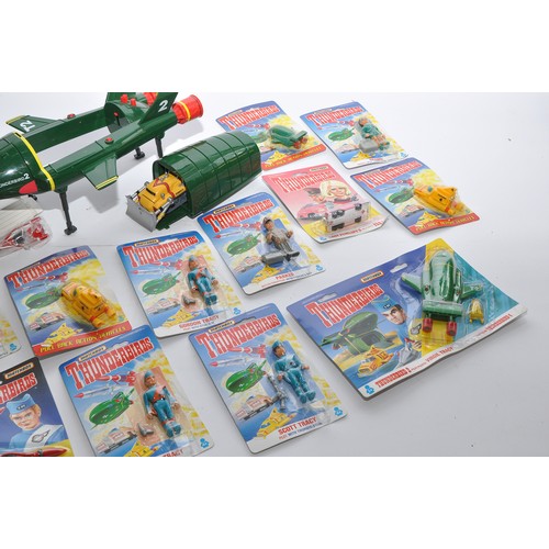 288 - Thunderbirds (Gerry Anderson). An impressive collection of Matchbox Carded Thunderbird figures and V... 