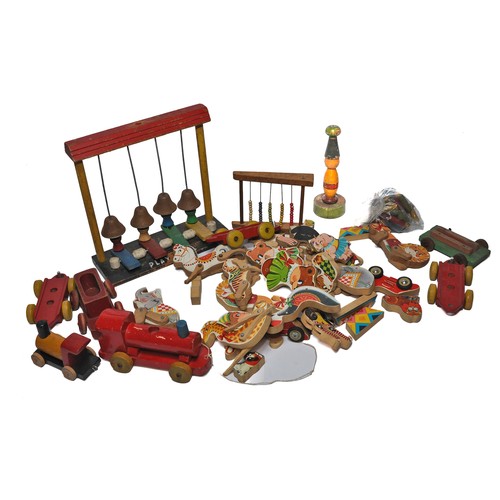 336 - An assortment of old wooden children's toys as shown including animal figures.