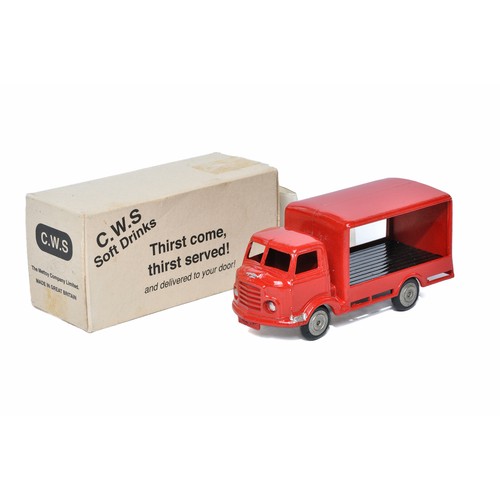 Corgi (Mettoy) No. 455 Smiths Karrier Bantam Truck in the livery of CWS Soft Drinks. Red body, black base inc inner back, cast spun hubs and silver trim. Displays excellent, little sign of wear. Looks to be some possible touching in but still a very hard to find promotional model. Contained in a generally excellent box, including leaflet.