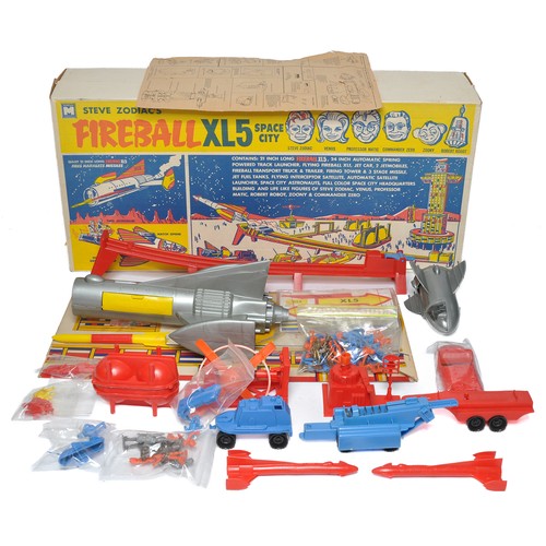 Multiple Toy Makers (USA) (for Gerry Anderson) Steve Zodiac's Fireball XL5 Space City Set comprising multiple plastic vehicles, figures and accessories as shown. Believed to be complete and appears to have had little or no use. Contained in generally excellent original box. A rare opportunity.