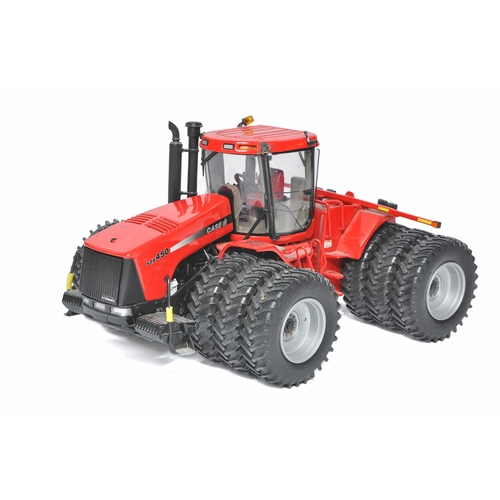 42 - Ertl 1/32 diecast farm model issue comprising Case STX 450 Tractor. Model is likely fair to good onl... 