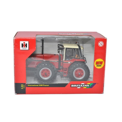 66 - Britains 1/32 diecast farm model issue comprising International 3588 Tractor. Model is likely fair t... 