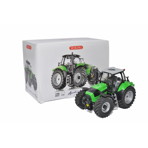 87 - Wiking 1/32 diecast farm model issue comprising Deutz Agrotron Tractor. Model is likely fair to good... 