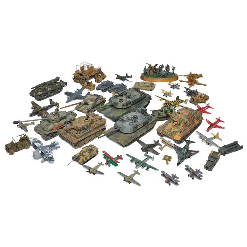 183 - An interesting assortment of plastic (kit made) military vehicles plus diecast aircraft (the odd pla... 