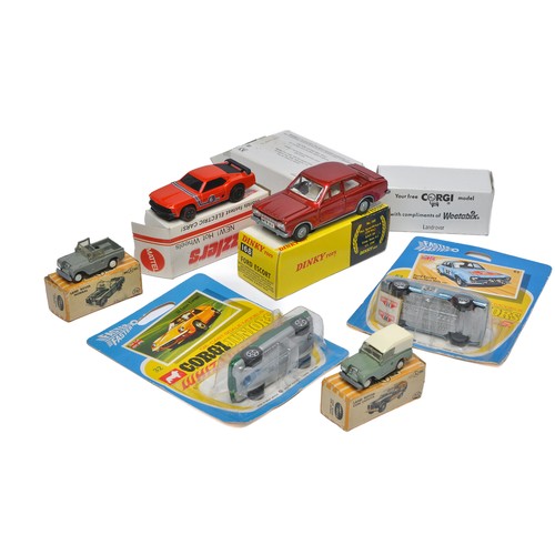 235 - An assortment of interesting vintage diecast toys including Corgi Junior Ford Escort, Dinky Ford Esc... 