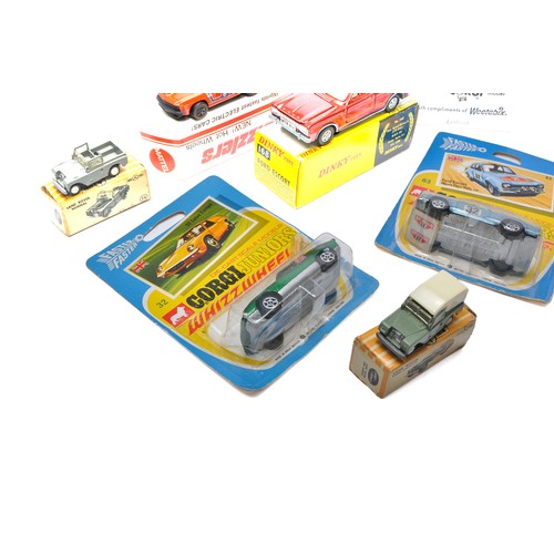 235 - An assortment of interesting vintage diecast toys including Corgi Junior Ford Escort, Dinky Ford Esc... 