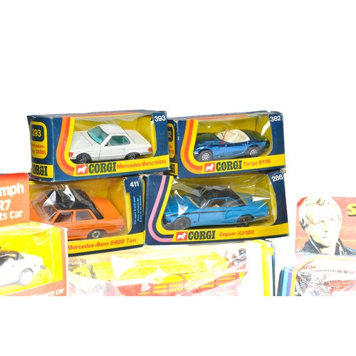 242 - An interesting group of boxed vintage diecast issues including Corgi, Dinky and Matchbox. Some items... 