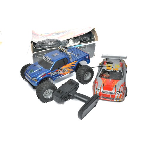 347 - A duo of radio control cars including one petrol powered issue, as shown.