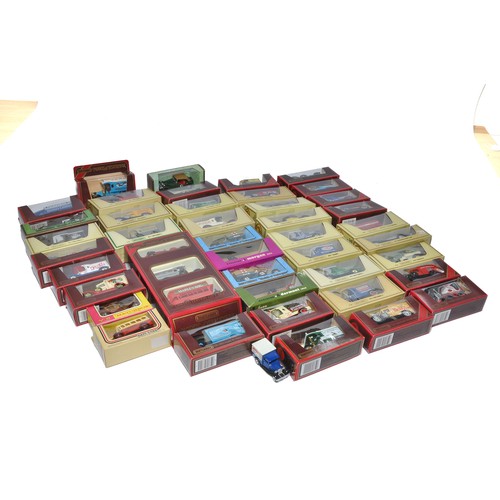 398 - A group of 32 Matchbox Models of Yesteryear diecast promotional van / vehicle issues in boxes as sho... 