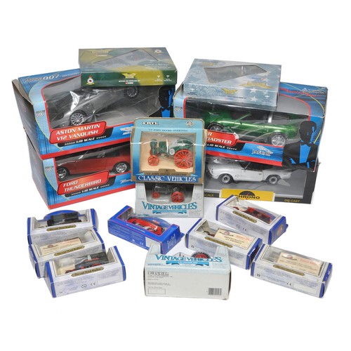 406 - A group of 1/18 diecast model vehicles inclusive of a trio of James Bond issues (likely displayed an... 