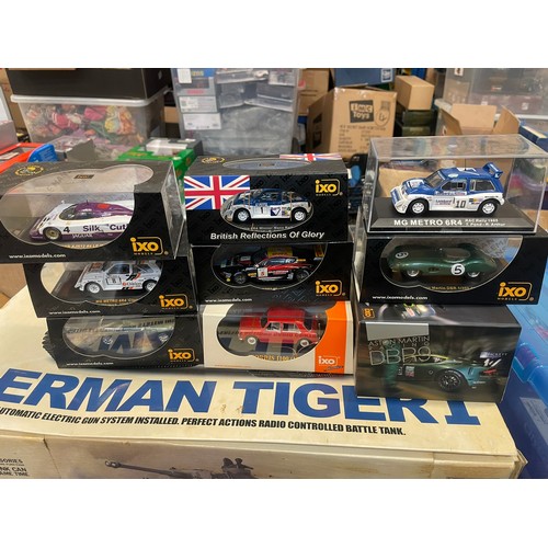 289 - An impressive selection of 1/43 higher detail diecast models from IXO including MG Metro, Jaguar, As... 