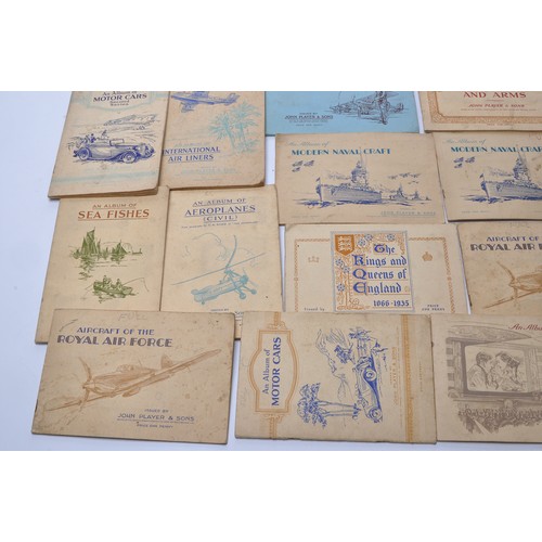 432 - A large collection of vintage John Player Cigarette Cards contained within 43 themed albums to inclu... 