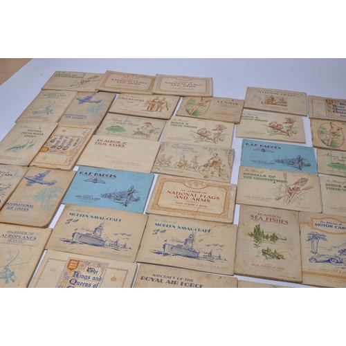 432 - A large collection of vintage John Player Cigarette Cards contained within 43 themed albums to inclu... 