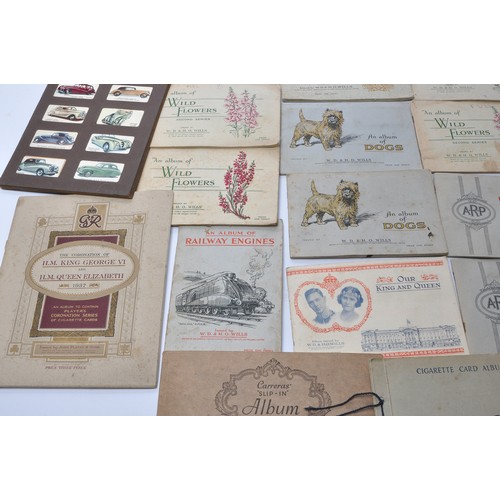 433 - A large collection of vintage Wills / John Player and other Cigarette Cards contained within various... 