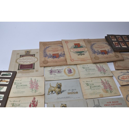 433 - A large collection of vintage Wills / John Player and other Cigarette Cards contained within various... 