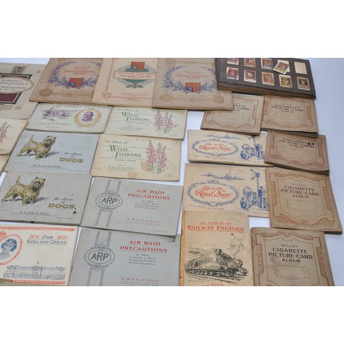 433 - A large collection of vintage Wills / John Player and other Cigarette Cards contained within various... 