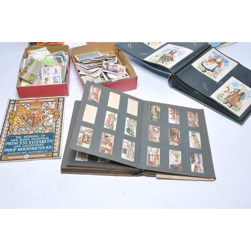 436 - Further Vintage cigarette cards to include an album containing pre-1930 issues including Dickens Cha... 