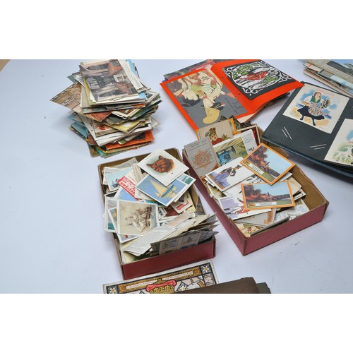 436 - Further Vintage cigarette cards to include an album containing pre-1930 issues including Dickens Cha... 