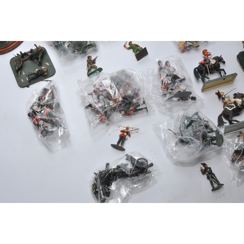 44A - A large collection of military figures, mostly painted plastic issues from Airfix (to include some f... 