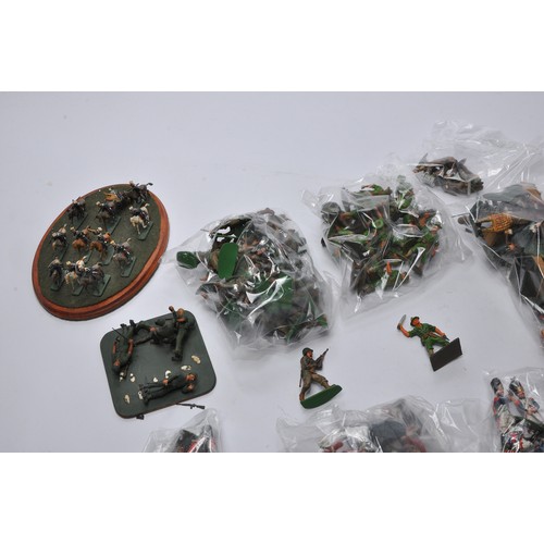 44A - A large collection of military figures, mostly painted plastic issues from Airfix (to include some f... 