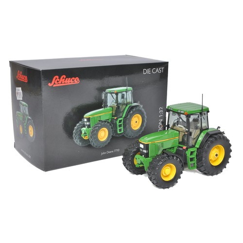 654 - Schuco 1/32 Farm Model issue comprising John Deere 7710 Tractor. Excellent. Box is excellent.