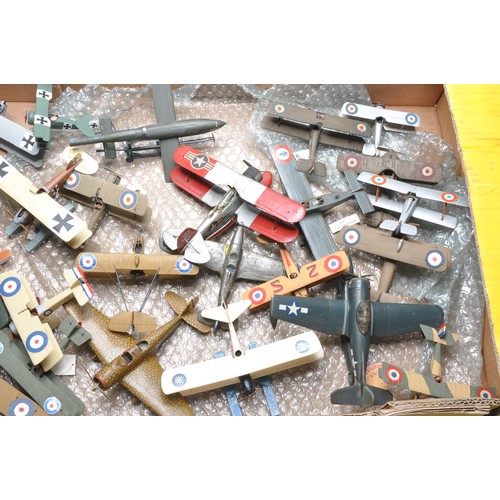 1121 - A quantity of hand built model aircraft, mostly 1/72 scale comprising various military issues as sho... 