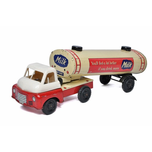 1133 - Wells friction driven tinplate and plastic Milk Tanker. In working order. Generally good with some s... 