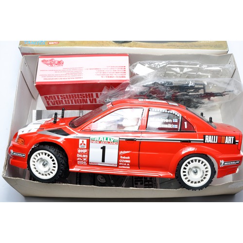 137 - Tamiya 1/10 RC 4WD High Performance Mitsubishi Rally Car. Assembled as shown, untested.