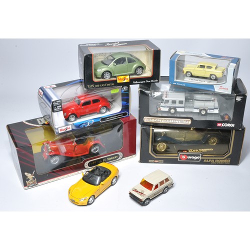 548 - A group of six boxed diecast model vehicles in various scales from Burago, Corgi and others as shown... 