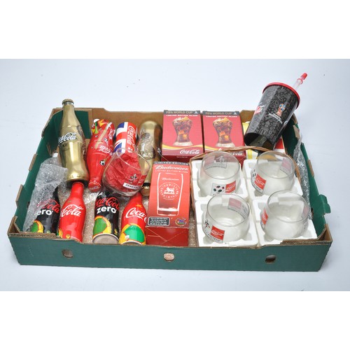 580 - An interesting collection of Coca Cola Merchandise including promotional bottles (still sealed) for ... 