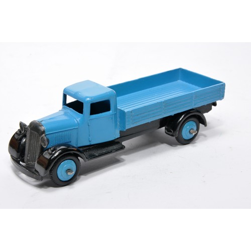 610 - Dinky No. 25a Open back Wagon. Issue is in light blue as shown inc hubs. Generally displays very goo... 
