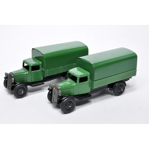 612 - Dinky No. 25b Covered Wagon. Duo of issue in green as shown one is darker shade. Generally displayve... 