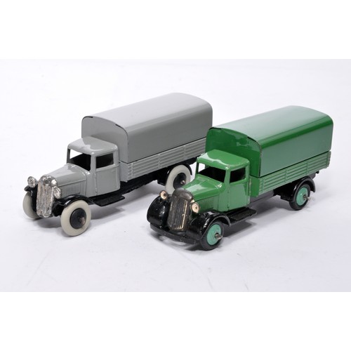 614 - Dinky No. 25b Covered Wagon. Duo of issue in green and grey as shown (note base variations plus gree... 