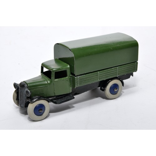 616 - Dinky No. 25b Covered Wagon. Issue is in darker green with blue hubs as shown, open chassis. General... 