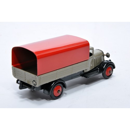 618 - Dinky No. 25b Covered Wagon. Issue is in fawn with red tilt and hubs as shown. Generally displays ve... 