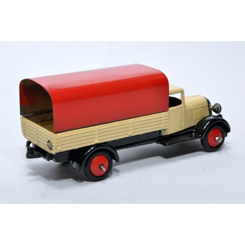 621 - Dinky No. 25b Covered Wagon. Issue is in cream with red tilt and hubs as shown. Generally displays v... 