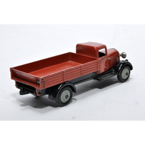 636 - Dinky No. 25e Tipping Wagon. Issue is in brown with grey hubs as shown. Displays very good to excell... 
