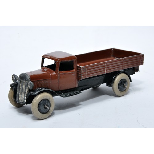 637 - Dinky No. 25e Tipping Wagon. Issue is in dark brown as shown. Open chassis. Displays generally very ... 