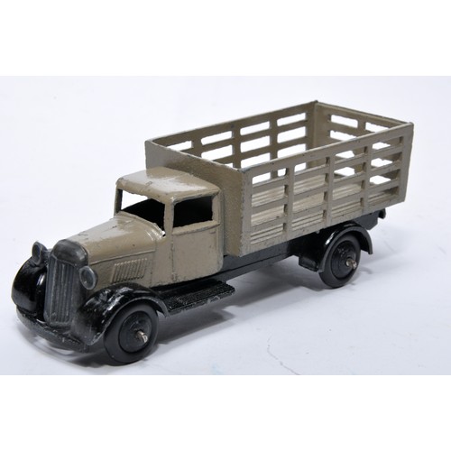 640 - Dinky No. 25f Market Garden Wagon. Issue is in fawn grey, as shown. Displays generally fair to good ... 